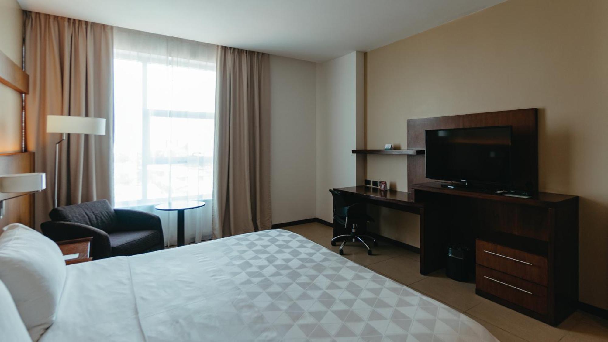 Holiday Inn Guayaquil Airport By Ihg Exterior foto A room at the hotel