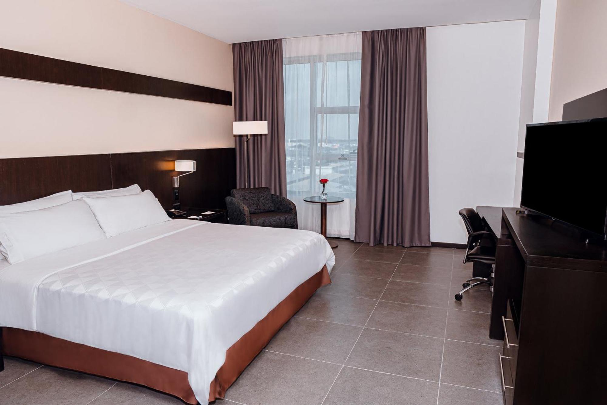Holiday Inn Guayaquil Airport By Ihg Exterior foto A room at the hotel